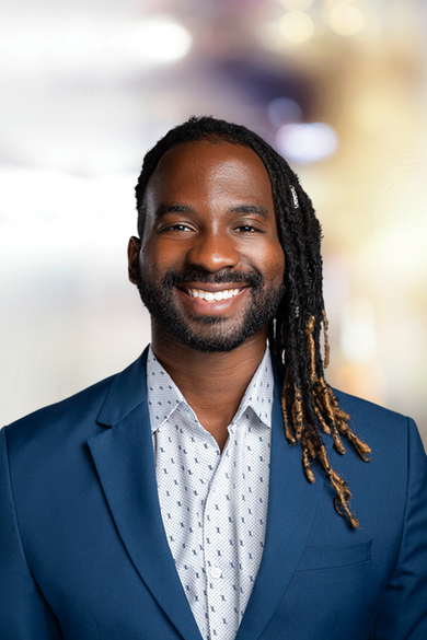 Portrait of Ike Opaigbeogu, REALTOR®.